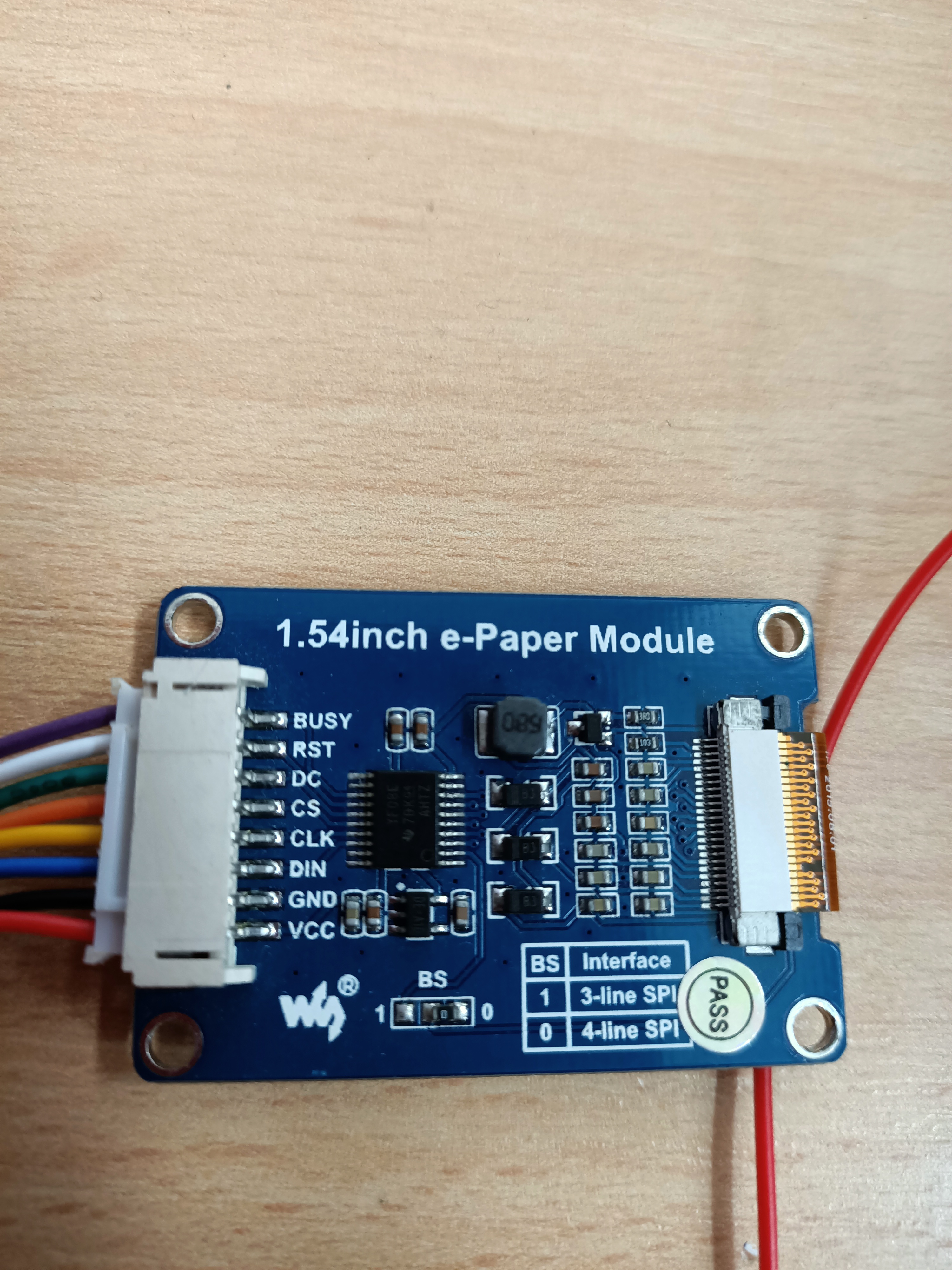 Back of the Waveshare module showing BUSY, RST, DC, CS, CLK, DIN, GND, VCC and the BS jumper
