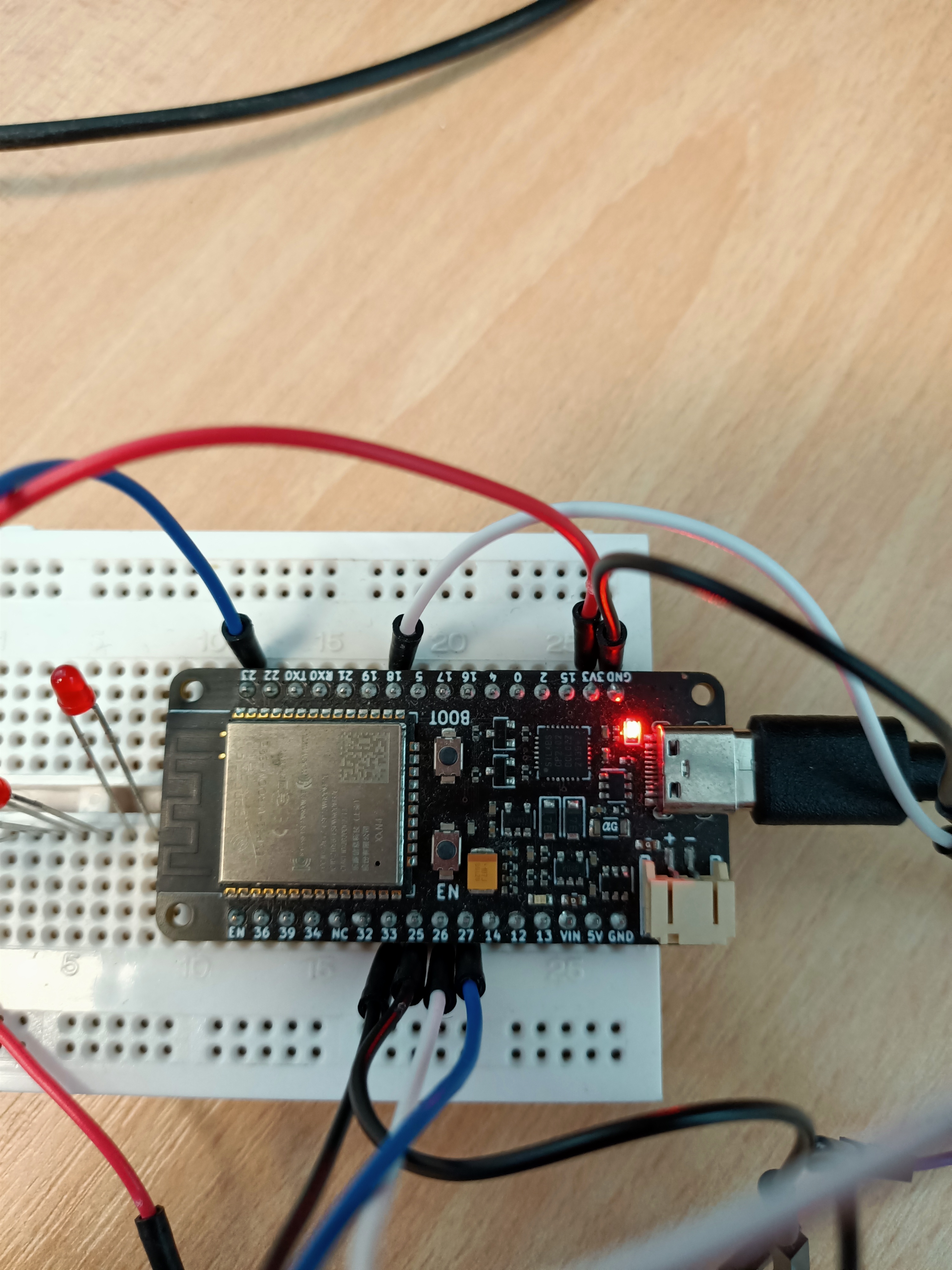 Close-up of the uPesy ESP32 Low Power and its breadboard connections